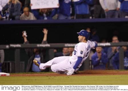 Kansas City Royals first baseman Eric Hosmer (35) slides into third base on a hit by designated hitter Kendrys Morales against the Toronto Blue Jays in the sixth inning of game 1 of the American League Championship Series at Kauffman Stadium in Kansas City, Missouri on October 16, 2015.  KCP20151016126 JEFFxMOFFETT