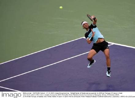 Rafael Nadal of Spain serves against Jo-Wilfried Tsonga of France in their semi-final match of the men s singles during the 2015 Shanghai Rolex Masters tennis tournament in Shanghai, China, 17 October 2015. Jo-Wilfried Tsonga competes with Rafael Nadal of Spain in semi-final at Shanghai Rolex Masters  20151017_48993