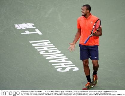 Jo-Wilfried Tsonga of France reacts after scoring against Rafael Nadal of Spain in their semi-final match of the men s singles during the 2015 Shanghai Rolex Masters tennis tournament in Shanghai, China, 17 October 2015. Jo-Wilfried Tsonga competes with Rafael Nadal of Spain in semi-final at Shanghai Rolex Masters  20151017_63149