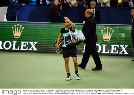 Rafael Nadal of Spain waves after being defeated by Jo-Wilfried Tsonga of France in their semi-final match of the men s singles during the 2015 Shanghai Rolex Masters tennis tournament in Shanghai, China, 17 October 2015. Jo-Wilfried Tsonga of France defeated Rafael Nadal of Spain 2-1 (6-4 0-6 7-5) in their semi-final match of the men s singles during the 2015 Shanghai Rolex Masters tennis tournament in Shanghai, China, 17 October 2015. Jo-Wilfried Tsonga ousts Rafael Nadal to advance to final at Shanghai Rolex Masters  20151017_09605