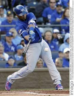 Toronto Blue Jays Edwin Encarnacion hits a single off Kansas City Royals Yordano Ventura in the second inning of game 2 of the American League Championship Series at Kauffman Stadium in Kansas City, Missouri on October 17, 2015.  KCP20151017214 JEFFxMOFFETT