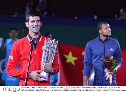 Oct. 18, 2015 - Shanghai, People s Republic of China - NOVAK DJOKOVIC of Serbia poses for photos with his trophy after win the match against JO WILFRIED TSONGA of France, during the final of the Shanghai Rolex Masters Tennis Tournament, Djokovic won Tsonga 2 - 0. Tennis 2015 - Shanghai Masters  - ZUMAm119