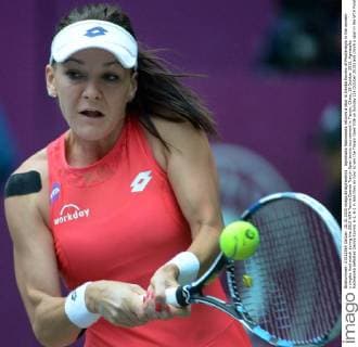 Agnieszka Radwanska returns a shot to Danka Kovinic of Montenegro in the women s singles final match during the 2015 WTA Tennis Damen Tianjin Open tennis tournament in Tianjin, China, 18 October 2015. Agnieszka Radwanska defeated Danka Kovinic 6-1, 6-2 in less than an hour to win the Tianjin Open title on Sunday (18 October 2015) and clinch a spot in the WTA Finals in Singapore. The second-seeded Radwanska broke Kovinic five times and saved all five break points she faced. The Polish player didn t lose a set in five matches this week to win her 16th career WTA Tour title. Radwanska became the fifth player to qualify for the year-end championships, joining Maria Sharapova, Simona Halep, Petra Kvitova and Garbine Muguruza in the field. Top-ranked Serena Williams is skipping the tournament to rest and recover from injuries. Radwanska has qualified for the WTA Finals for the fifth consecutive year. Radwanska wins Tianjin Open to qualify for WTA Finals  20151018_12588