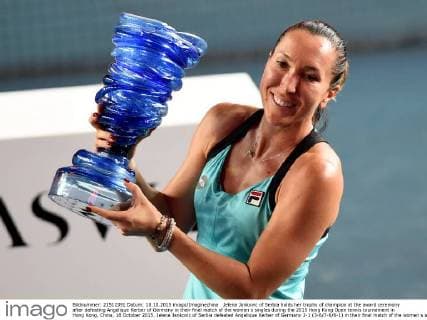 Jelena Jankovic of Serbia holds her trophy of champion at the award ceremony after defeating Angelique Kerber of Germany in their final match of the women s singles during the 2015 Hong Kong Open tennis tournament in Hong Kong, China, 18 October 2015. Jelena Jankovic of Serbia defeated Angelique Kerber of Germany 2-1 (3-6 7-6 6-1) in their final match of the women s singles during the 2015 Hong Kong Open tennis tournament in Hong Kong, China, 18 October 2015. Jelena Jankovic crowns Hong Kong Open title  20151019_56922