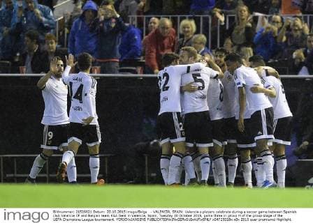 - VALENCIA, SPAIN: Valencia s players celebrate during a soccer game between Spanish club Valencia CF and Belgian team KAA Gent in Valencia, Spain, Tuesday 20 October 2015, game three in group H of the group stage of the UEFA Champions League tournament. YORICKxJANSENS  x04725018x