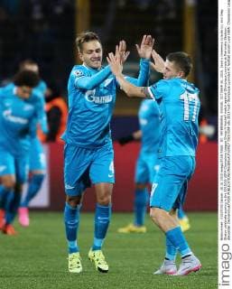 ST. PETERSBURG, RUSSIA. OCTOBER 20, 2015. Zenit s Domenico Criscito (L) and Oleg Shatov celebrate scoring in the 2015 16 UEFA Champions League Group H football match against Olympique Lyonnais at Petrovsky Stadium. Alexander Demianchuk TASS  TS01035F