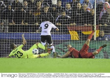 - VALENCIA, SPAIN: Gent s Lasse Nielsen, Valencia s Paco Alcacer and Gent s goalkeeper Matz Sels fight for the ball during a soccer game between Spanish club Valencia CF and Belgian team KAA Gent in Valencia, Spain, Tuesday 20 October 2015, game three in group H of the group stage of the UEFA Champions League tournament. YORICKxJANSENS  x04725035x