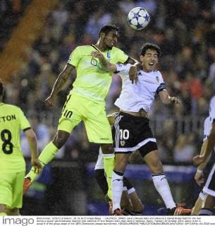 - VALENCIA, SPAIN: Gent s Renato Neto and Valencia s Daniel Parejo fight for the ball during a soccer game between Spanish club Valencia CF and Belgian team KAA Gent in Valencia, Spain, Tuesday 20 October 2015, game three in group H of the group stage of the UEFA Champions League tournament. YORICKxJANSENS  x04725041x