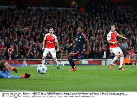 Arsenal s Mesut Ozil sees his shot saved by Bayern Munich s Manuel Neuer Champions League Group Match - Arsenal vs Bayern Munich - Emirates Stadium - England - 20th October 2015 - Picture David Klein Sportimage EDITORIAL USE ONLY. No use with unauthorised audio, video, data, fixture lists, club league logos or live services. Online in-match use limited to 120 images, no video emulation. No use in betting, games or single club league player publications.