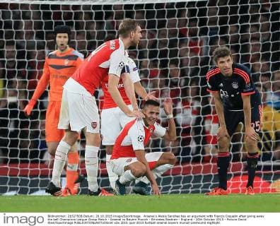 Arsenal s Alexis Sanchez has an argument with Francis Coquelin after giving away the ball Champions League Group Match - Arsenal vs Bayern Munich - Emirates Stadium - England - 20th October 2015 - Picture David Klein Sportimage EDITORIAL USE ONLY. No use with unauthorised audio, video, data, fixture lists, club league logos or live services. Online in-match use limited to 120 images, no video emulation. No use in betting, games or single club league player publications.