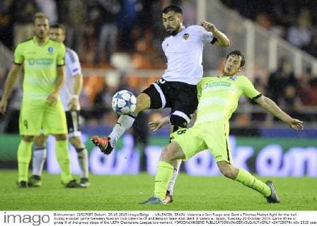- VALENCIA, SPAIN: Valencia s Javi Fuego and Gent s Thomas Matton fight for the ball during a soccer game between Spanish club Valencia CF and Belgian team KAA Gent in Valencia, Spain, Tuesday 20 October 2015, game three in group H of the group stage of the UEFA Champions League tournament. YORICKxJANSENS  x04725074x