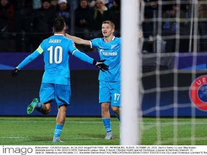ST. PETERSBURG, RUSSIA. OCTOBER 20, 2015. Zenit s Danny (L) and Oleg Shatov celebrate scoring in the 2015 16 UEFA Champions League Group H Round 3 football match against Olympique Lyonnais at Petrovsky Stadium. FC Zenit St. Petersburg won the game 3:1. Alexander Demianchuk TASS  TS010373