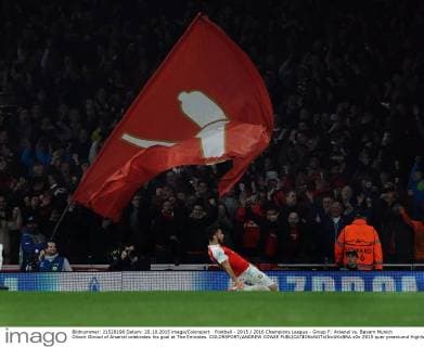 Football - 2015 2016 Champions League - Group F: Arsenal vs. Bayern Munich Oliveir Giroud of Arsenal celebrates his goal at The Emirates. COLORSPORT ANDREW COWIE 