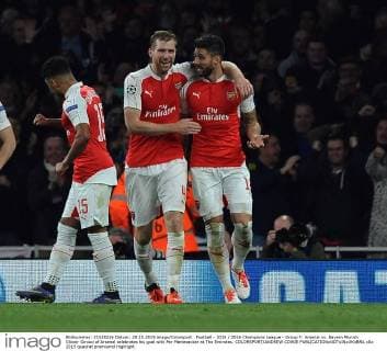 Football - 2015 2016 Champions League - Group F: Arsenal vs. Bayern Munich Oliveir Giroud of Arsenal celebrates his goal with Per Mertesacker at The Emirates. COLORSPORT ANDREW COWIE 