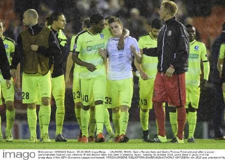 - VALENCIA, SPAIN: Gent s Renato Neto and Gent s Thomas Foket pictured after a soccer game between Spanish club Valencia CF and Belgian team KAA Gent in Valencia, Spain, Tuesday 20 October 2015, game three in group H of the group stage of the UEFA Champions League tournament. YORICKxJANSENS  x04725105x