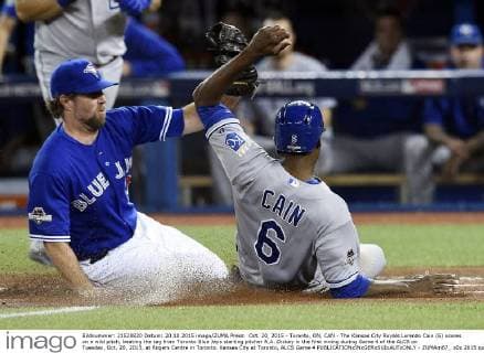 Oct. 20, 2015 - Toronto, ON, CAN - The Kansas City Royals Lorenzo Cain (6) scores on a wild pitch, beating the tag from Toronto Blue Jays starting pitcher R.A. Dickey in the first inning during Game 4 of the ALCS on Tuesday, Oct. 20, 2015, at Rogers Centre in Toronto. Kansas City at Toronto, ALCS Game 4 - ZUMAm67_
