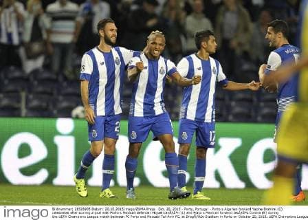 Oct. 20, 2015 - Porto, Portugal - Porto s Algerian forward Yacine Brahimi (C) celebrates after scoring a goal with Porto s Mexican defender Miguel LayÃƒÂºn (L) and Porto s Mexican forward JesÃƒÂºs Corona (R) during the UEFA Champions League match between FC Porto and Maccabi Tel-Aviv FC, at DragÃƒÂ£o Stadium in Porto on October 20, 2015. UEFA Champions League: FC Porto and Maccabi Tel-Aviv  - ZUMAn230