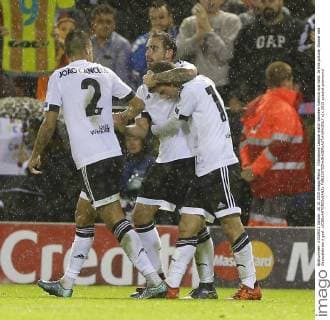 Champions League match between Valencia and Gent. In this picture, Alcacer and Gayacelebrate a goal. xJOSExANTONIOxSANZx 