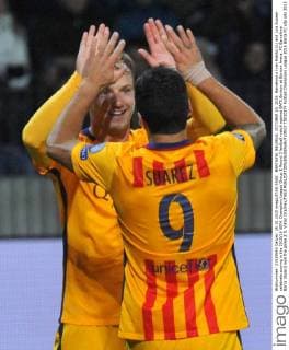 BARYSAW, BELARUS. OCTOBER 20, 2015. Barcelona s Ivan Rakitic (L) and Luis Suarez celebrate scoring in the 2015 16 UEFA Champions League Group E Round 3 football match against BATE Borisov at Borisov Arena. FC Barcelona Barca (Spain) won the game 2:0. Viktor Drachev TASS  TS01037F