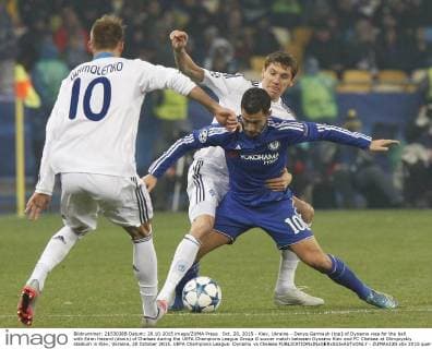 Oct. 20, 2015 - Kiev, Ukraine - Denys Garmash (top) of Dynamo vies for the ball with Eden Hazard (down) of Chelsea during the UEFA Champions League Group G soccer match between Dynamo Kiev and FC Chelsea at Olimpiyskiy stadium in Kiev, Ukraine, 20 October 2015. UEFA Champions League: Dynamo vs Chelsea  - ZUMAn230