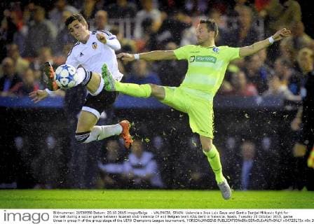 - VALENCIA, SPAIN: Valencia s Jose Luis Gaya and Gent s Danijel Milicevic fight for the ball during a soccer game between Spanish club Valencia CF and Belgian team KAA Gent in Valencia, Spain, Tuesday 20 October 2015, game three in group H of the group stage of the UEFA Champions League tournament. YORICKxJANSENS  x04725175x