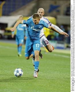 October 20, 2015. - Russia, Saint Petersburg. - UEFA Champions League 2015 16 - FC Zenit Saint Petersburg vs FC Olympique Lyonnais (Lyon), 3:1. In picture: FC Zenit player Oleg Shatov (17), FC Lyon player Christophe Jallet (13). PhotoagencyxInterpress 