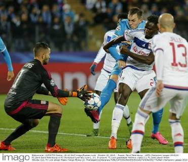 October 20, 2015. - Russia, Saint Petersburg. - UEFA Champions League 2015 16 - FC Zenit Saint Petersburg vs FC Olympique Lyonnais (Lyon), 3:1. In picture: FC Lyon goalkeeper Anthony Lopes (1), FC Zenit player Artem Dzyuba (22), FC Lyon player Mapou Yanga-Mbiwa (2). PhotoagencyxInterpress 