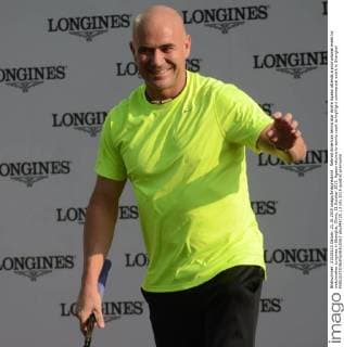 Retired American tennis star Andre Agassi attends a promotional event by watchmaker Longines in Shanghai, China, 21 October 2015. Agassi returns to tennis court to highlight commercial event in Shanghai  pbu348725_13