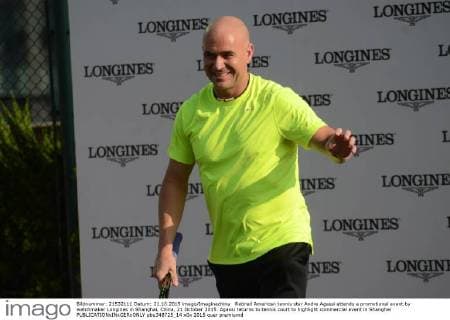 Retired American tennis star Andre Agassi attends a promotional event by watchmaker Longines in Shanghai, China, 21 October 2015. Agassi returns to tennis court to highlight commercial event in Shanghai  pbu348725_14