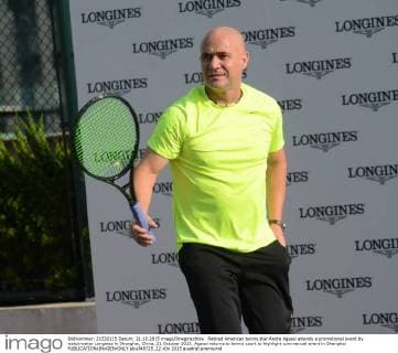 Retired American tennis star Andre Agassi attends a promotional event by watchmaker Longines in Shanghai, China, 21 October 2015. Agassi returns to tennis court to highlight commercial event in Shanghai  pbu348725_22