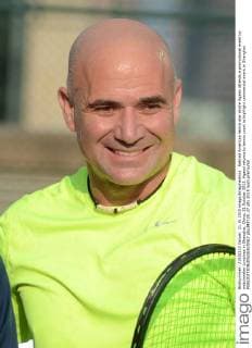 Retired American tennis star Andre Agassi attends a promotional event by watchmaker Longines in Shanghai, China, 21 October 2015. Agassi returns to tennis court to highlight commercial event in Shanghai  pbu348725_27