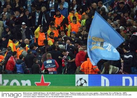 Fighting breaks out in the away section - Manchester City vs FC Sevilla - UEFA Champions League - Etihad Stadium - Manchester - 21 10 2015 Pic Philip Oldham SportImage EDITORIAL USE ONLY. No use with unauthorised audio, video, data, fixture lists, club league logos or live services. Online in-match use limited to 120 images, no video emulation. No use in betting, games or single club league player publications.