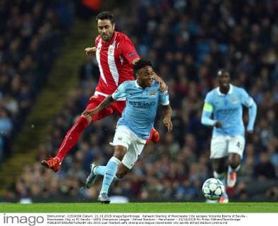 Raheem Sterling of Manchester City escapes Vincente Iborra of Sevilla - Manchester City vs FC Sevilla - UEFA Champions League - Etihad Stadium - Manchester - 21 10 2015 Pic Philip Oldham SportImage EDITORIAL USE ONLY. No use with unauthorised audio, video, data, fixture lists, club league logos or live services. Online in-match use limited to 120 images, no video emulation. No use in betting, games or single club league player publications.