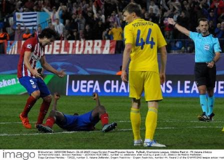 Fußball, Champions League, Atletico Madrid - FK Astana Atletico de Madrid Forward, Jackson Martinez - JACKSON MARTINEZ, number 11 celebrates after scoring a goal (2,0). Atletico de Madrid Midfielder, Tiago Cardoso Mendes - TIAGO, number 5. Astana Defender, Evgeni Postnikov - Evgeni Postnikov, number 44. Round 3 of the CHAMPIONS league soccer match between Atletico de Madrid - Astana at the Vicente Calderon estadium Madrid - Spain by October 21 2015. 