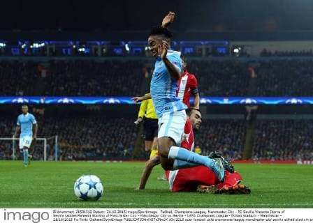 Fußball, Champions League, Manchester City - FC Sevilla Vincente Iborra of Sevilla tackles Raheem Sterling of Manchester City - Manchester City vs Sevilla - UEFA Champions League - Etihad Stadium - Manchester - 21 10 2015 Pic Philip Oldham SportImage EDITORIAL USE ONLY. No use with unauthorised audio, video, data, fixture lists, club league logos or live services. Online in-match use limited to 120 images, no video emulation. No use in betting, games or single club league player publications.
