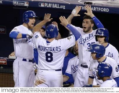 Oct. 23, 2015 - Kansas City, MO, USA - The Kansas City Royals Mike Moustakas (8) celebrates with teammates after scoring on a single by Alex Rios in the seventh inning against the Toronto Blue Jays during Game 6 of the ALCS on Friday, Oct. 23, 2015, at Kauffman Stadium in Kansas City, Mo. Toronto at Kansas City, ALCS Game 6 - ZUMAm67_
