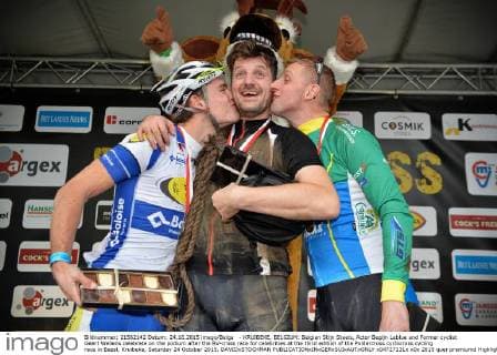 - KRUIBEKE, BELGIUM: Belgian Stijn Steels, Actor Begijn Leblue and Former cyclist Geert Wellens celebrate on the podium after the BV-cross race for celebrities at the third edition of the Poldercross cyclocross cycling race in Bazel, Kruibeke, Saturday 24 October 2015. DAVIDxSTOCKMAN  x04727131x