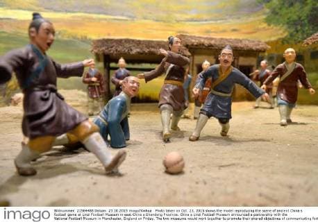 Photo taken on Oct. 23, 2015 shows the model reproducing the scene of ancient China s football game at Linzi Football Museum in east China s Shandong Province. China s Linzi Football Museum announced a partnership with the National Football Museum in Manchester, England on Friday. The two museums would work together to promote their shared objectives of communicating football culture to a world-wide audience. Linzi district, the birth place of Cuju, has been officially recognized by FIFA in 2004 as the origin of football. ) (SP)CHINA-LINZI-FOOTBALL MUSEUM ZhuxZheng 