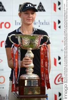 GURGAON, INDIA - OCTOBER 25: Golfer Emily Kristine Pedersen with the trophy after winning the championship during the 9th Edition of Hero Womens Indian Open Golf Championship at the DLF Golf & Country Club, on October 25, 2015 in Gurgaon, India. Denmark s Emily Kristine Pedersen won the title following a 73 in the $400,000 Hero Womens Indian Open. (Photo by Parveen Kumar Hindustan Times ) 9th Edition Of Hero Womens Indian Open Golf Championship