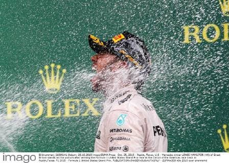 Oct. 25, 2015 - Austin, Texas, U.S - Mercedes driver LEWIS HAMILTON (44) of Great Britain stands on the podium after winning the Formula 1 United States Grand Prix race at the Circuit of the Americas race track in Austin,Texas. F1 2015 - Formula 1 United States Grand Prix. - ZUMAw300