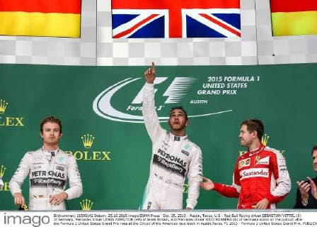 Oct. 25, 2015 - Austin, Texas, U.S - Red Bull Racing driver SEBASTIAN VETTEL (5) of Germany, Mercedes driver LEWIS HAMILTON (44) of Great Britain, and Mercedes driver NICO ROSBERG (6) of Germany stand on the podium after the Formula 1 United States Grand Prix race at the Circuit of the Americas race track in Austin,Texas. F1 2015 - Formula 1 United States Grand Prix. - ZUMAw300