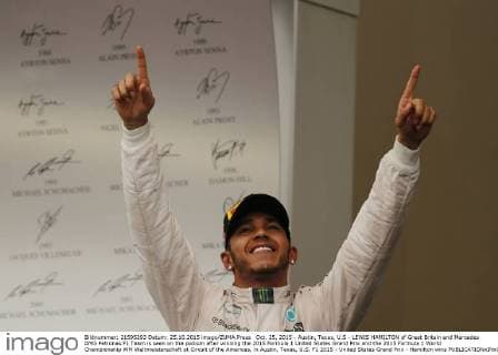 Oct. 25, 2015 - Austin, Texas, U.S - LEWIS HAMILTON of Great Britain and Mercedes AMG Petronas F1 Team is seen on the podium after winning the 2015 Formula 1 United States Grand Prix and the 2015 Formula 1 World Championship WM Weltmeisterschaft at Circuit of the Americas, in Austin, Texas, U.S. F1 2015 - United States Grand Prix - Hamilton wins - ZUMAg147