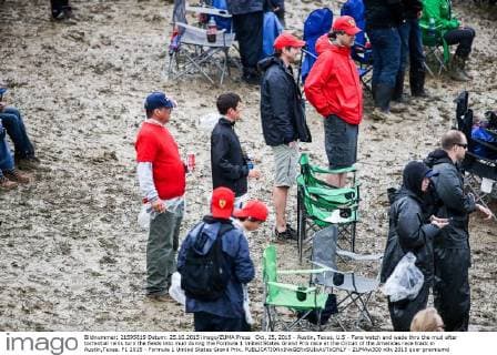 Oct. 25, 2015 - Austin, Texas, U.S - Fans watch and wade thru the mud after torrential rains turn the fields into mud during the Formula 1 United States Grand Prix race at the Circuit of the Americas race track in Austin,Texas. F1 2015 - Formula 1 United States Grand Prix. - ZUMAw300