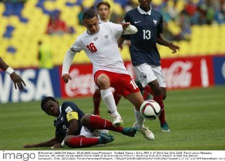 Football, France v Syria. FIFA U-17 World Cup Chile 2015. French player Mamadou Doucoure, left, battles the ball against Kamel Koaeh of Syria during the FIFA U-17 World Cup Chile 2015 Group F, at Ester Roa stadium. Concepcion , Chile. 25 10 2015. MarceloHernandez Photosport. 