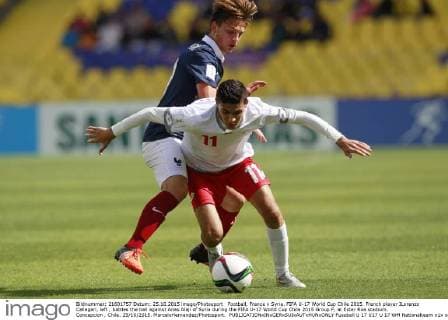Football, France v Syria. FIFA U-17 World Cup Chile 2015. French player ILorenzo Callegari, left , battles the ball against Anas Alaji of Syria during the FIFA U-17 World Cup Chile 2015 Group F, at Ester Roa stadium. Concepcion , Chile. 25 10 2015. MarceloHernandez Photosport. 