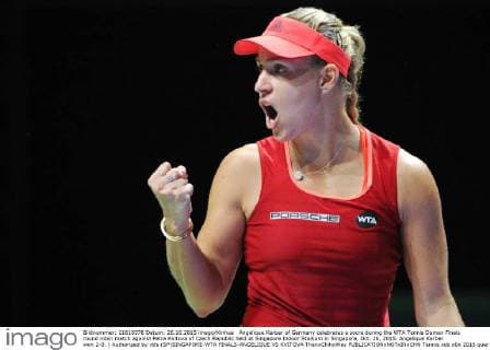 Angelique Kerber of Germany celebrates a socre during the WTA Tennis Damen Finals round robin match against Petra Kvitova of Czech Republic held at Singapore Indoor Stadium in Singapore, Oct. 26, 2015. Angelique Kerber won 2-0. ) Authorized by ytfs (SP)SINGAPORE-WTA FINALS-ANGELIQUE VS KVITOVA ThenxChihxWey 