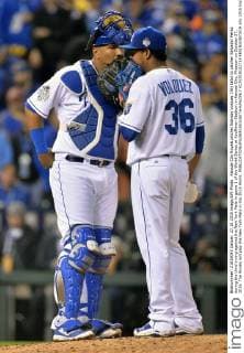 Kansas City Royals pitcher Edinson Volquez (36) talks to catcher Salvador Perez during the third inning against the New York Mets in game 1 of the World Series at Kauffman Stadium in Kansas City, Missouri on October 27, 2015. The Royals will play the New York Mets in the 2015 World.  KCP2015102713 KEVINxDIETSCH