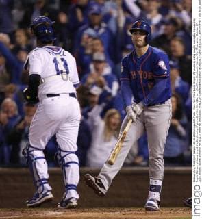 New York Mets David Wright (R) reacts to being caught looking by Kansas City Royals Edinson Volquez to end the third inning of game 1 of the World Series at Kauffman Stadium in Kansas City, Missouri on October 27, 2015. Royals catcher Salvador Perez (13) heads for the dugout.  KCP20151027217 JEFFxMOFFETT