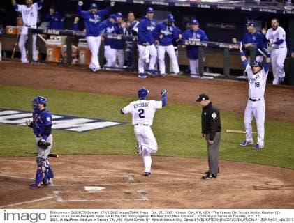 Oct. 27, 2015 - Kansas City, MO, USA - The Kansas City Royals Alcides Escobar (2) scores on an inside-the-park home run in the first inning against the New York Mets in Game 1 of the World Series on Tuesday, Oct. 27, 2015, at Kauffman Stadium in Kansas City, Mo. World Series, NY Mets at Kansas City, Game 1 - ZUMAm67_