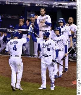 Oct. 27, 2015 - Kansas City, MO, USA - The Kansas City Royals Alex Gordon (4) is welcomed back to the dugout after hitting a solo home run in the ninth inning against the New York Mets in Game 1 of the World Series on Tuesday, Oct. 27, 2015, at Kauffman Stadium in Kansas City, Mo. World Series, NY Mets at Kansas City, Game 1 - ZUMAm67_